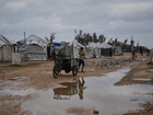 Young Palestinian boy drowns in muddy water flooding his Gaza tent camp